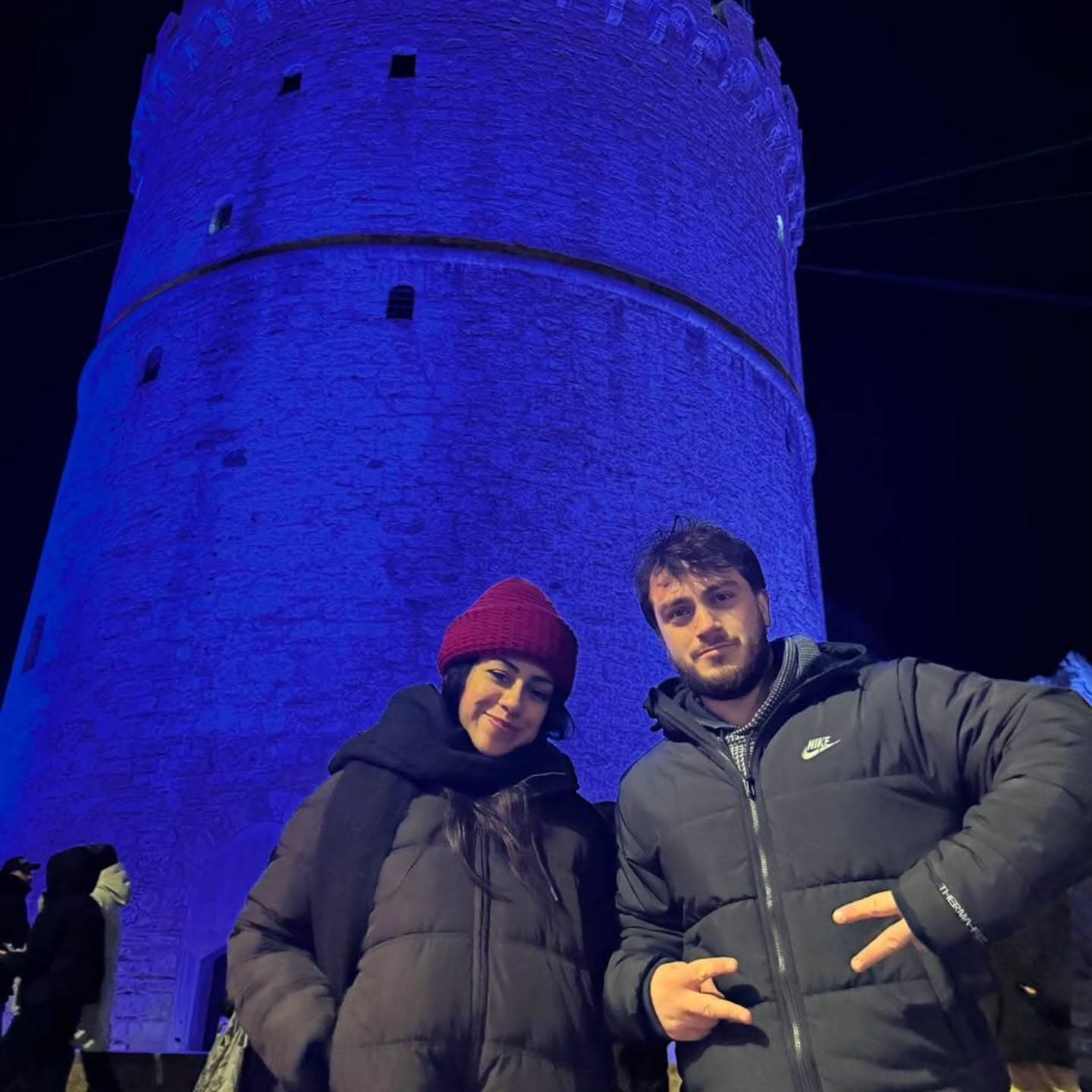 Blue stone tower at night